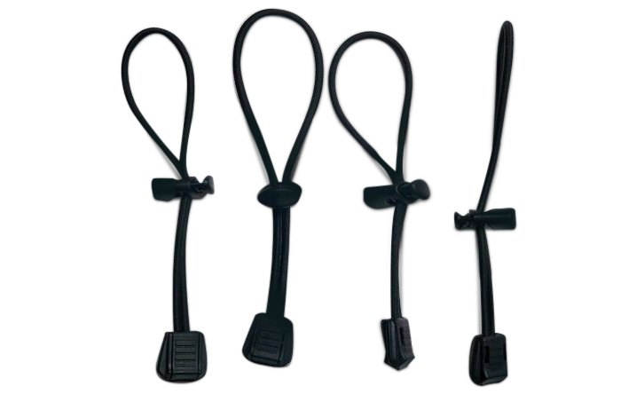 Elastic Cinch Cords Looped Through A Small Plastic Barrel Piece